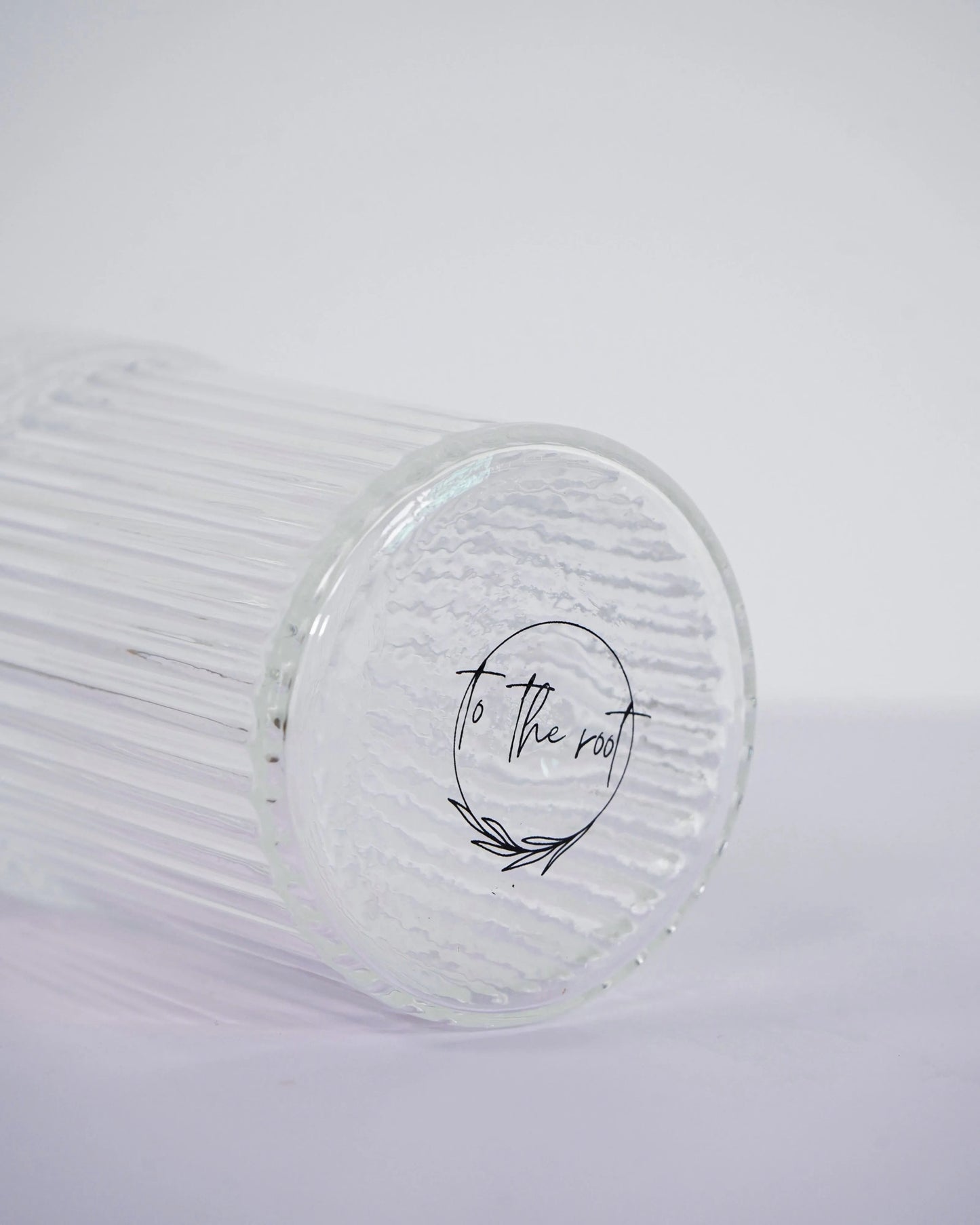 printed logo at the bottom of the glass cup